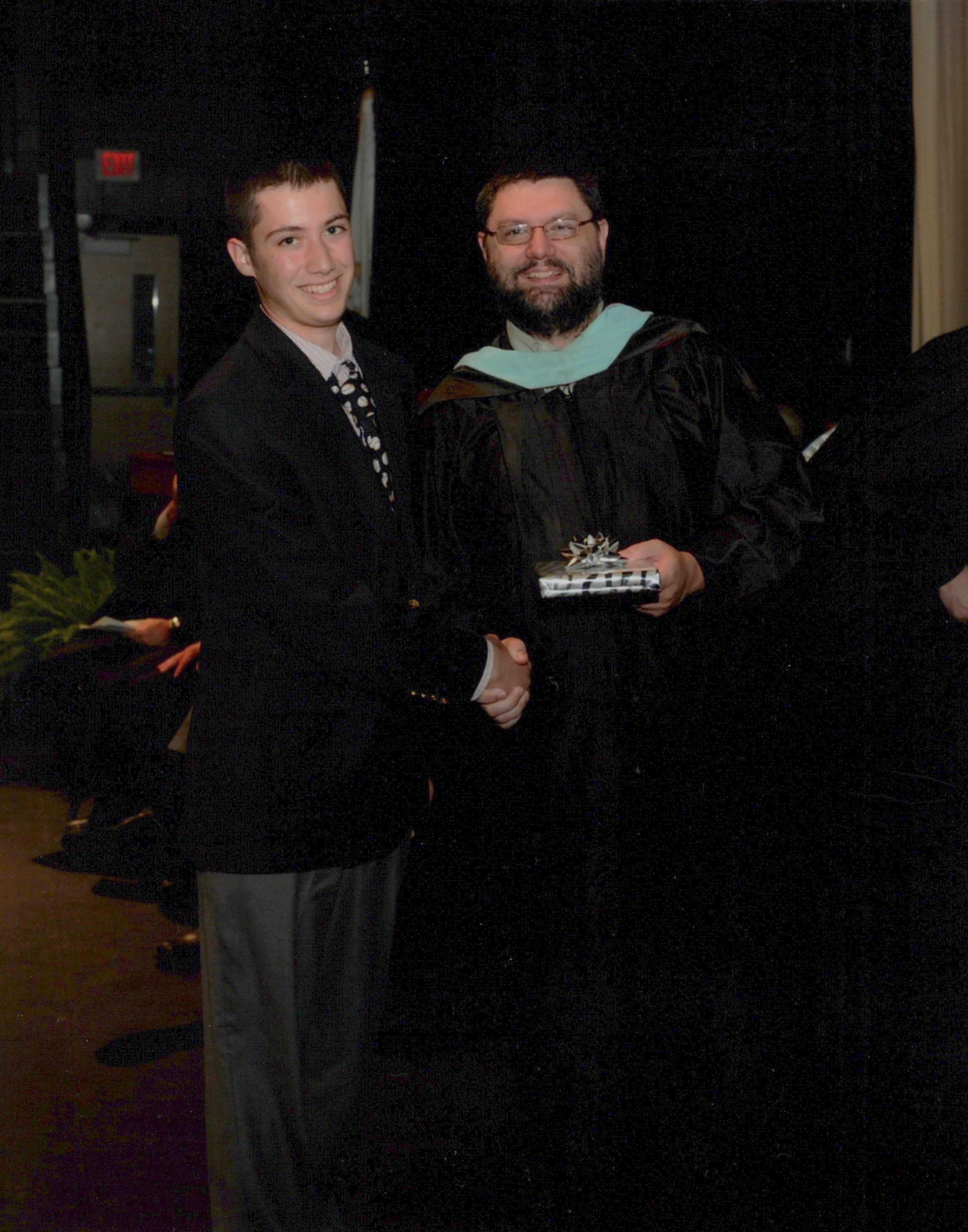 Joe Catalfamo receiving the American Mathematical Society Award at Bishop Hendricken